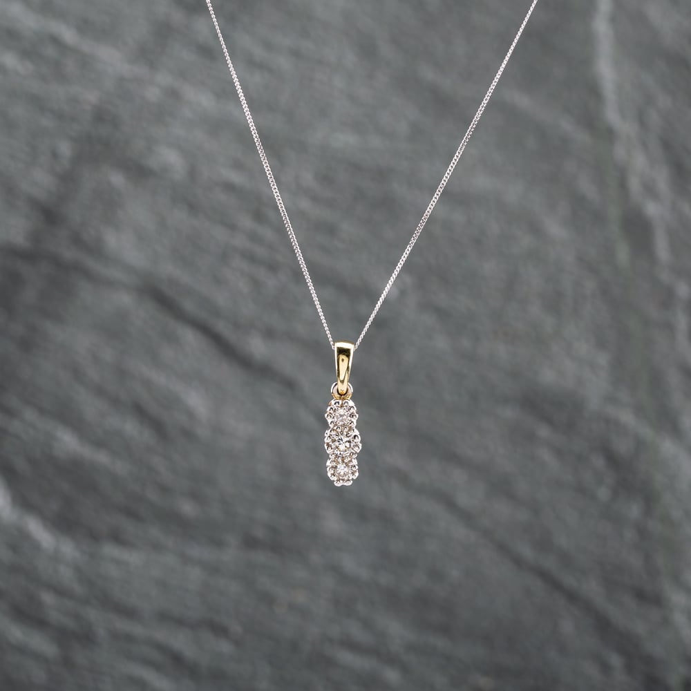 Click to view product details and reviews for Pre Owned 18ct Two Colour Gold 010ct Brilliant Cut Diamond Three Stone Gemstone Pendant And 18 Inch Curb Chain 41142821.