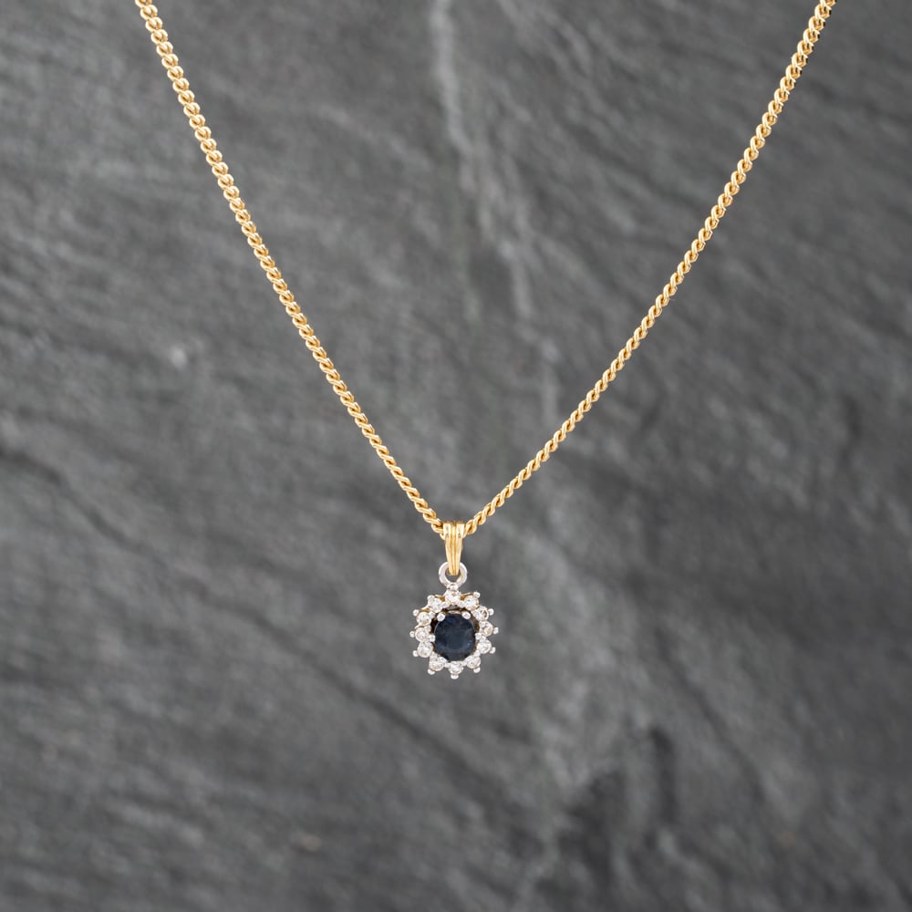 Click to view product details and reviews for Pre Owned 18ct Two Colour Gold Sapphire And Diamond Oval Cluster Pendant And 18 Inch Curb Chain 41142860. Click to view product details and reviews for Pre Owned 18ct Two Colour Gold Sapphire And Diamond Oval Cluster Pendant And 18 Inch Curb Chain 41142860.