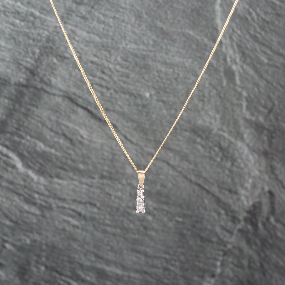 Click to view product details and reviews for Pre Owned 9ct Yellow Gold 025ct Brilliant Cut Diamond Trilogy Pendant And 18 Inch Curb Chain 41143030.