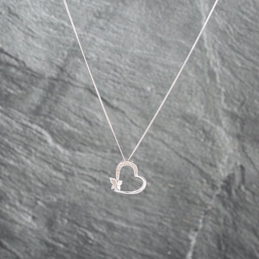 Click to view product details and reviews for Pre Owned 9ct White Gold Brilliant Cut Diamond Open Heart Butterfly Pendant And 18 Inch Curb Chain 41143073.