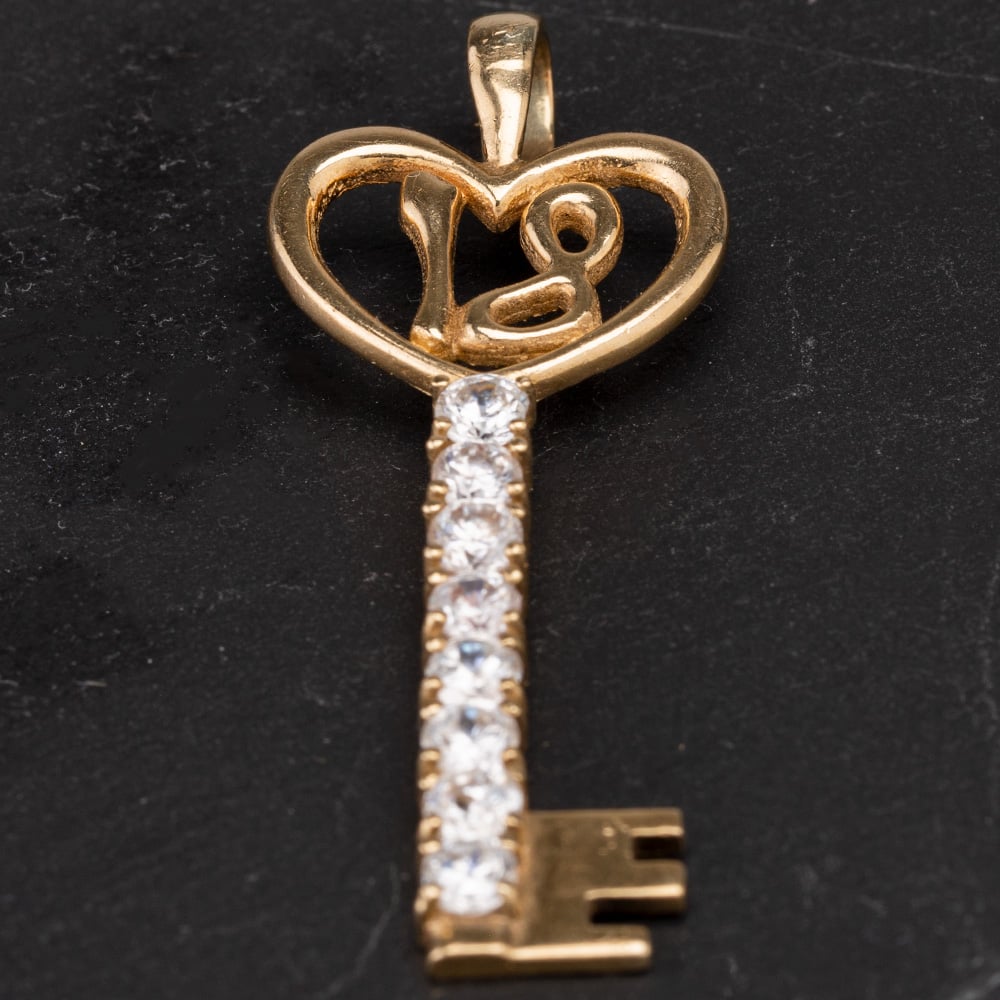 Product photograph of Pre-owned 9ct Yellow Gold Cubic Zirconia 18 Key Pendant 4114323 from The Jewel Hut