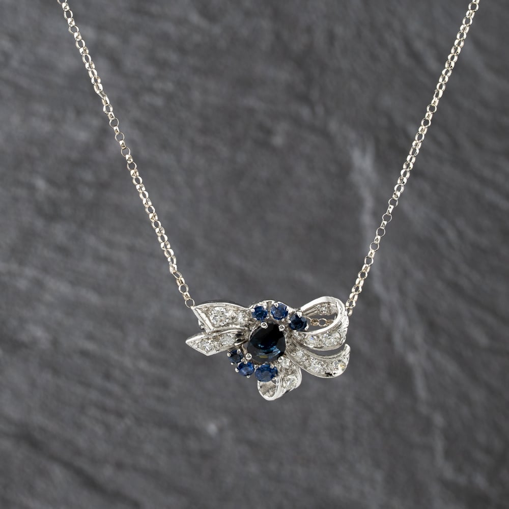 Pre-Owned 14ct White Gold Sapphire &amp; 0.82ct Brilliant Cut Diamond Fancy Bow Pendant &amp; 16 Inch Belcher Chain 41143353
