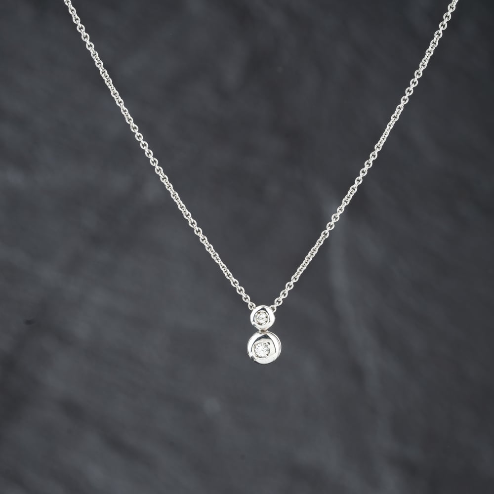 Pre-Owned 18ct White Gold 0.08ct Brilliant Cut Diamond Two Stone Pendant &amp; 16 Inch Trace Chain 41143448