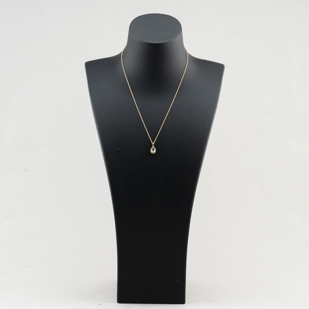 Pre-Owned Yellow Gold Blue Topaz Oval Pendant & 18 Inch Prince Of Wales Chain 41143627