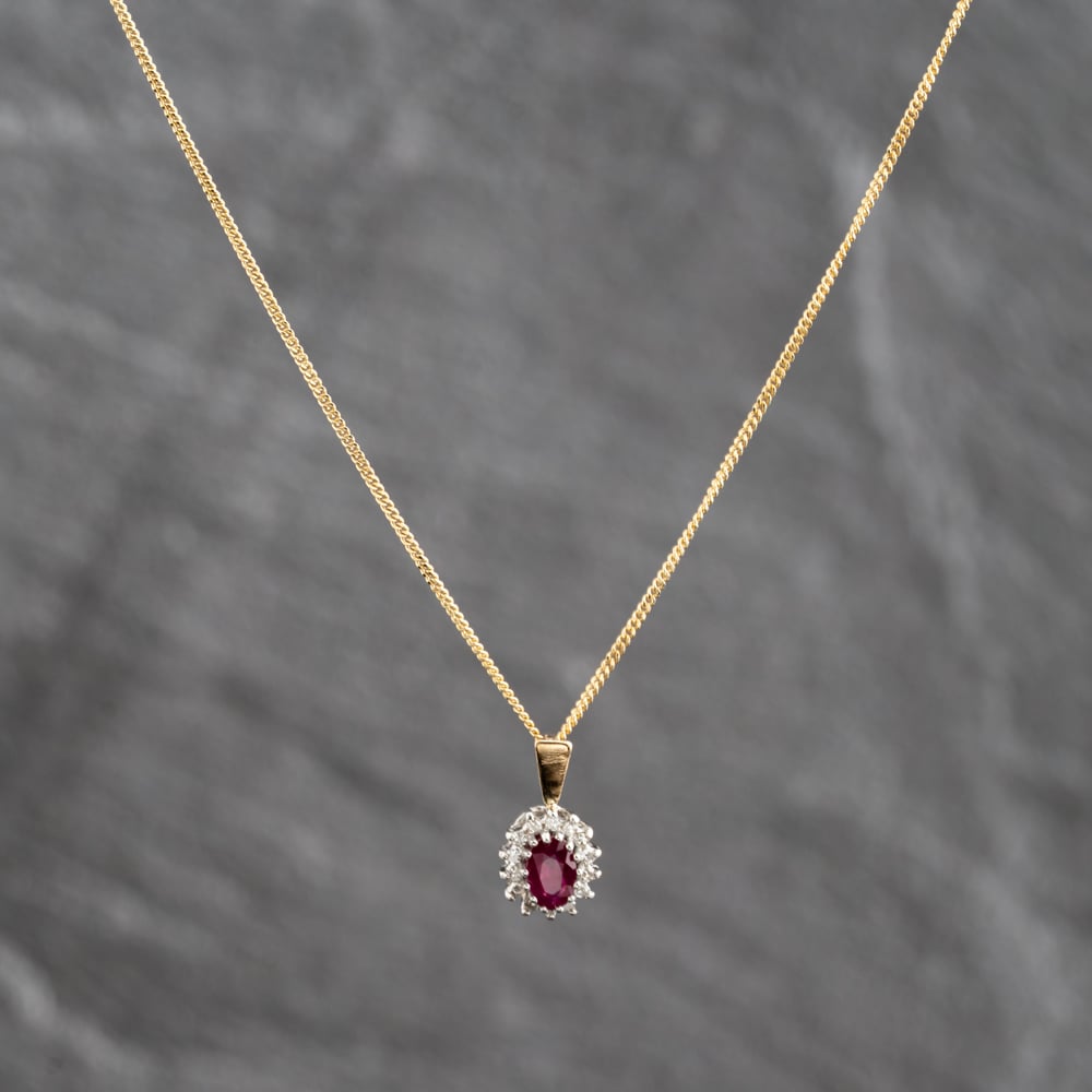 Pre-Owned 9ct Yellow Gold Ruby &amp; 0.08ct Diamond Oval Cluster Pendant &amp; 18 Inch Curb Chain 41143671