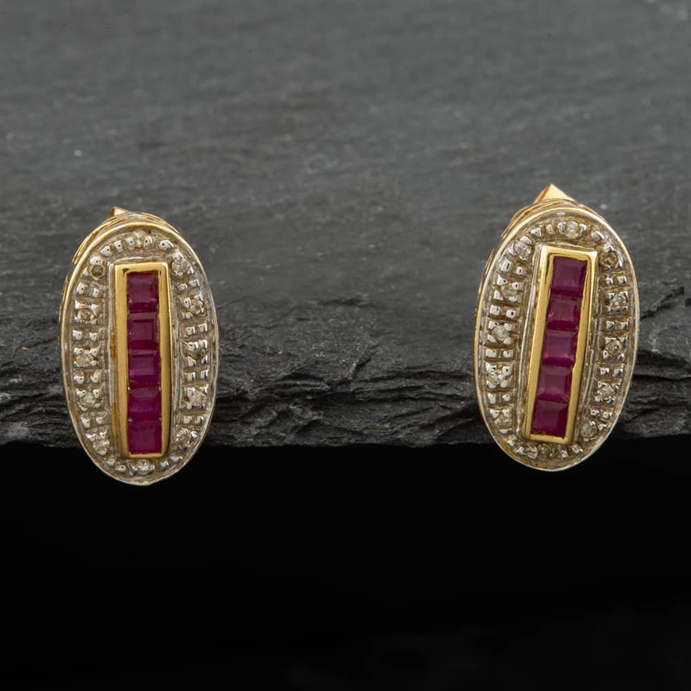 Product photograph of Pre-owned 9ct Yellow Gold Ruby Amp Diamond Elongated Oval Stud Earrings 41171309 from The Jewel Hut