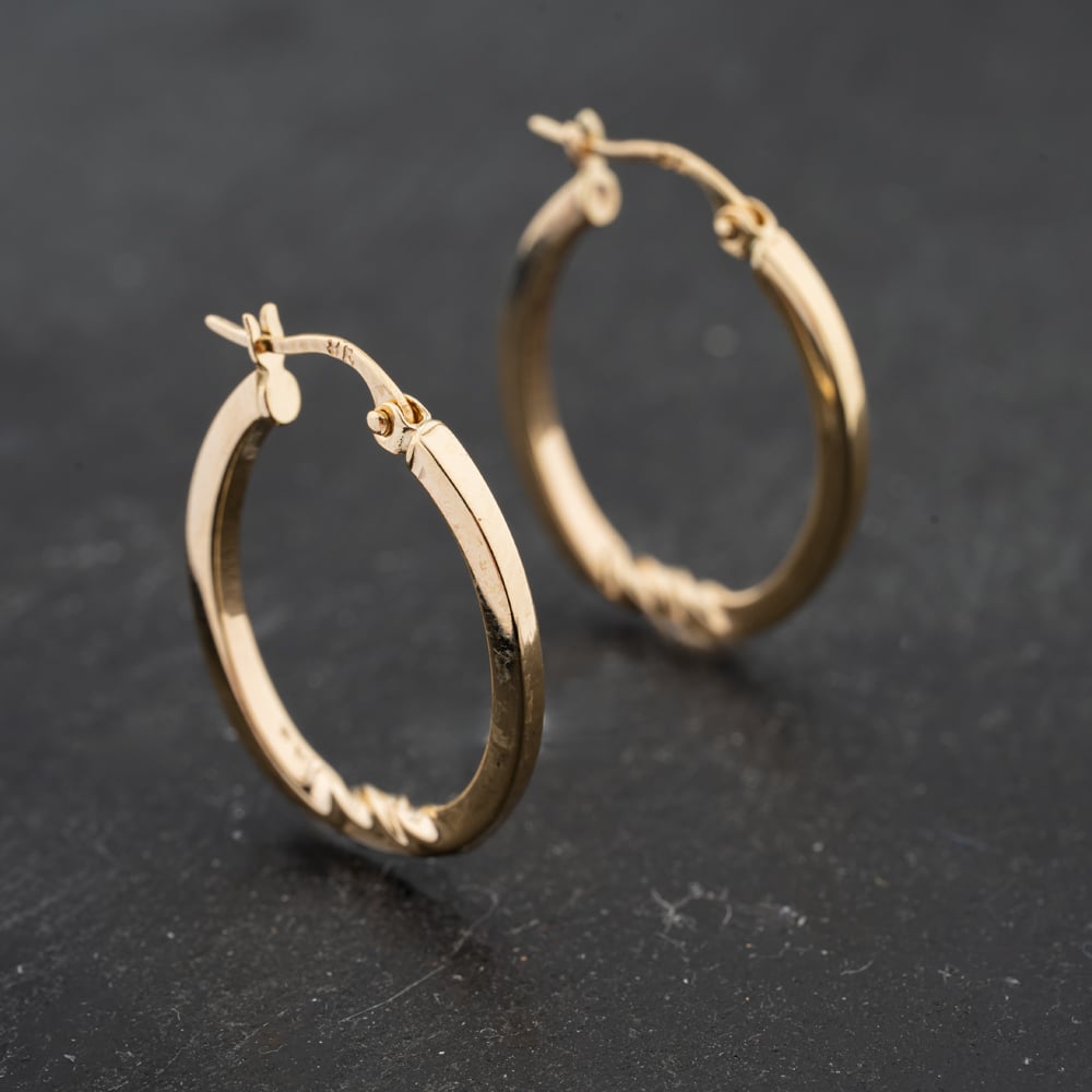Click to view product details and reviews for Pre Owned 9ct Yellow Gold 25mm Oval Rope Pattern Creole Earrings 41172461.