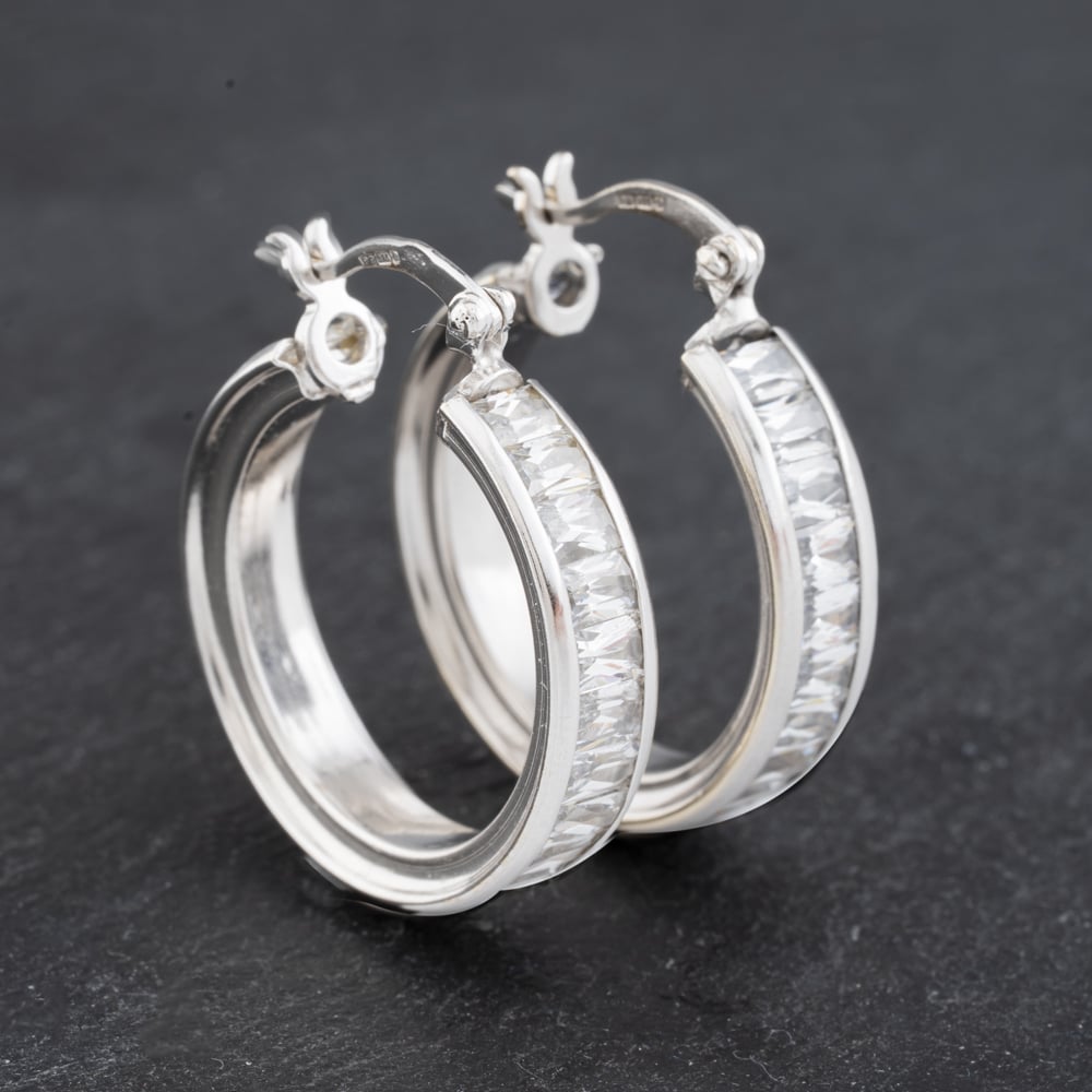 Click to view product details and reviews for Pre Owned 9ct White Gold 26mm Cubic Zirconia Hoop Earrings 41172904.