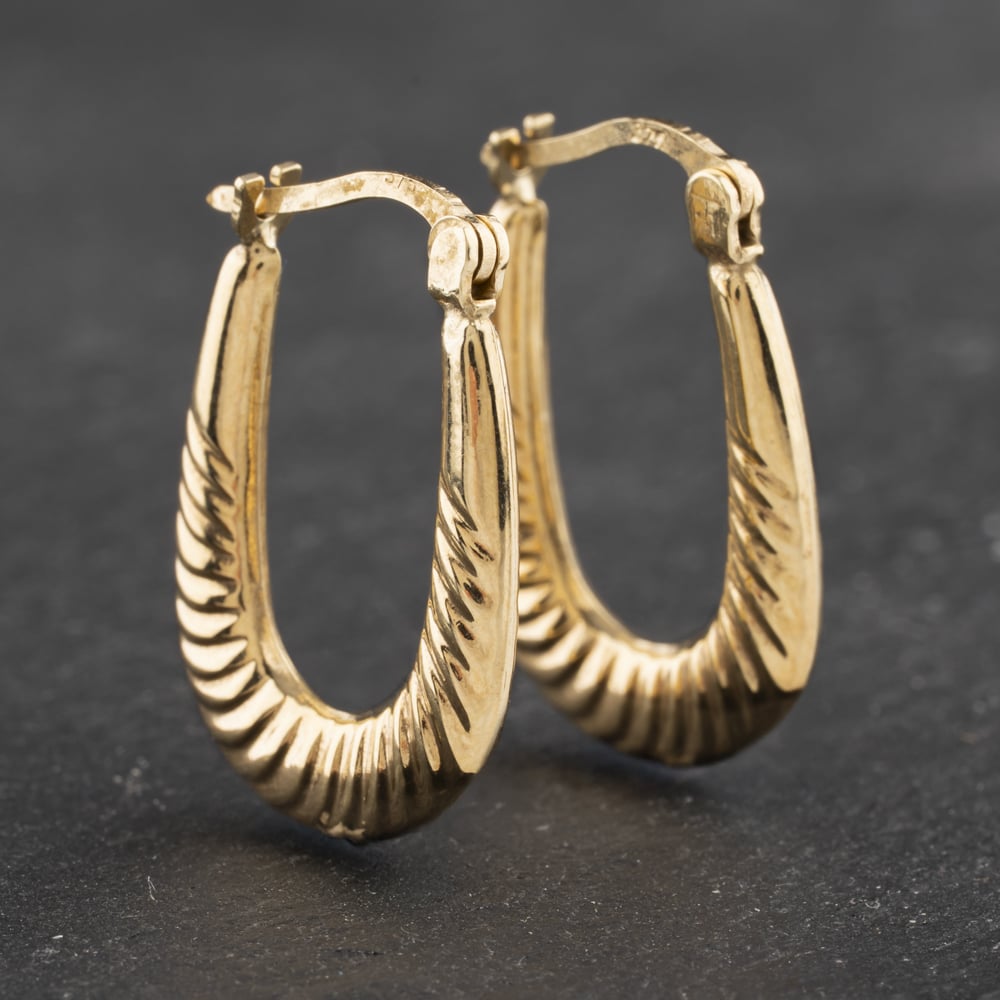 Click to view product details and reviews for Pre Owned Yellow Gold 21mm Lined Pattern Creole Earrings 41172974. Click to view product details and reviews for Pre Owned Yellow Gold 21mm Lined Pattern Creole Earrings 41172974.