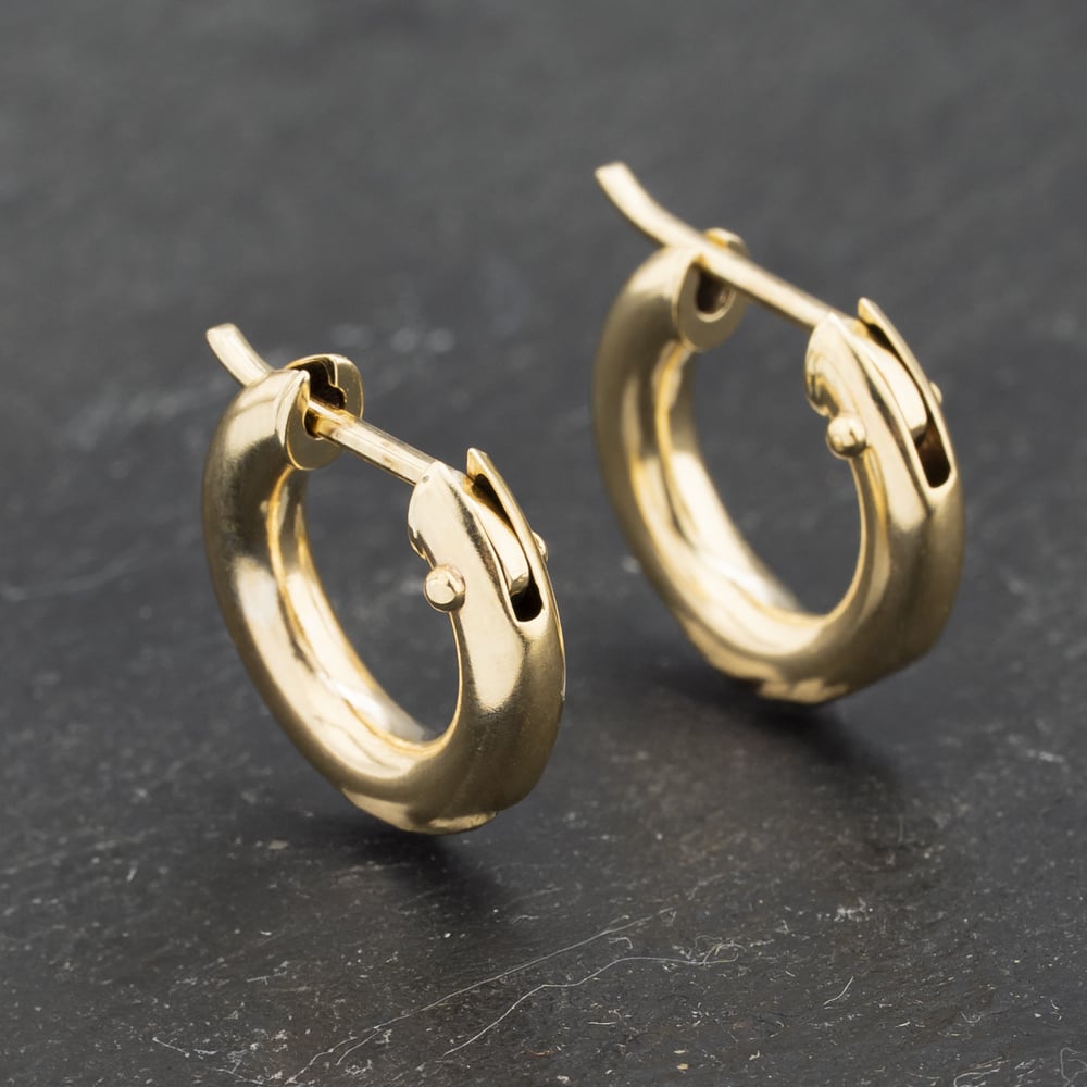 Click to view product details and reviews for Pre Owned Yellow Gold 12mm Small Plain Hoop Earrings 41173184.