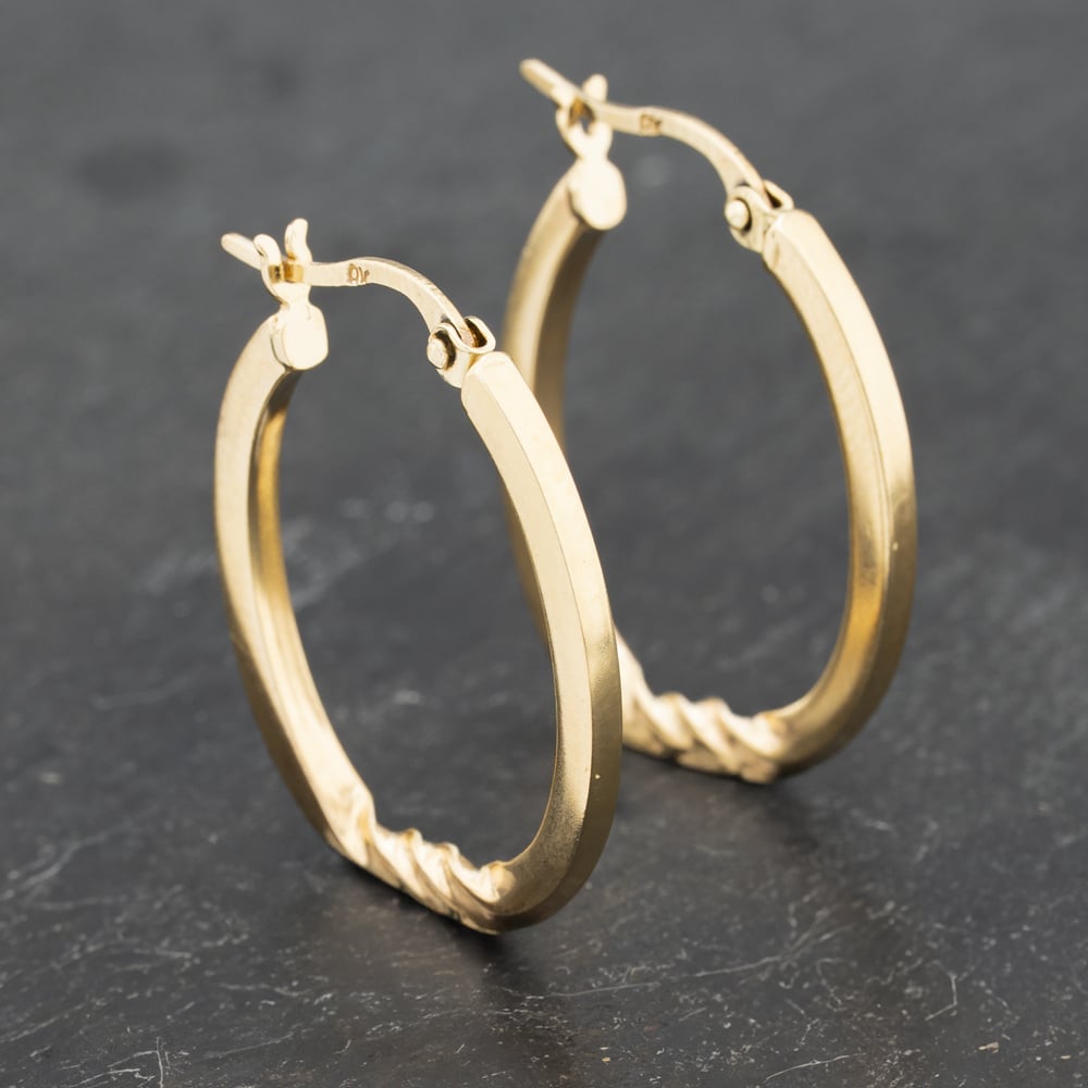 Click to view product details and reviews for Pre Owned Yellow Gold 25mm Rope Pattern Creole Earrings 41173190.