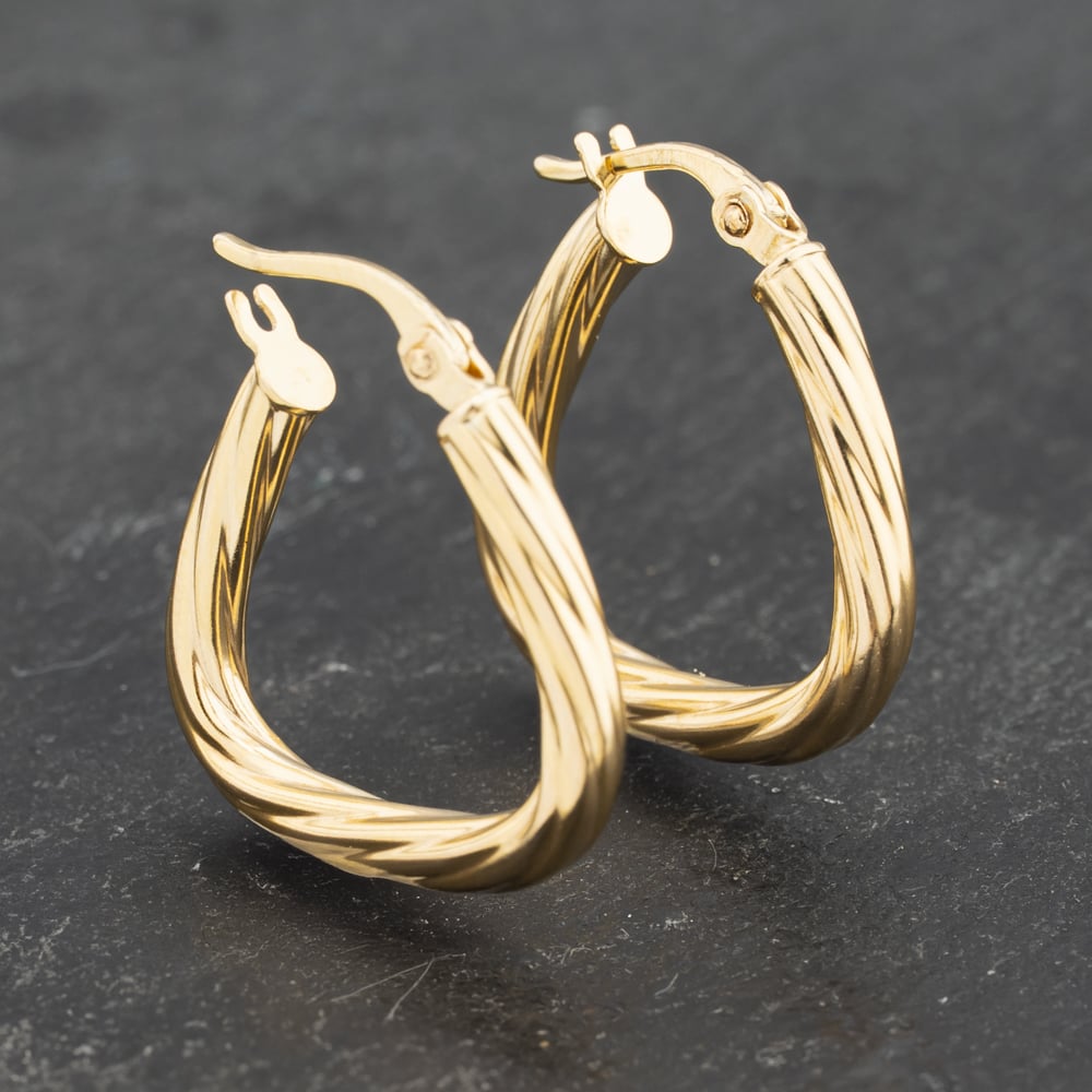 Click to view product details and reviews for Pre Owned Yellow Gold 215mm Twist Creole Earrings 41173226.
