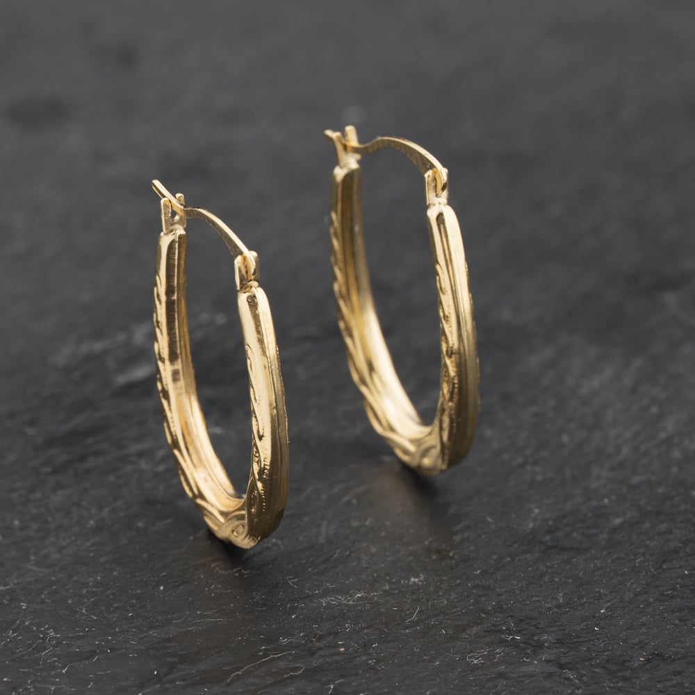 Click to view product details and reviews for Pre Owned Yellow Gold 22mm Celtic Creole Earrings 41173254.