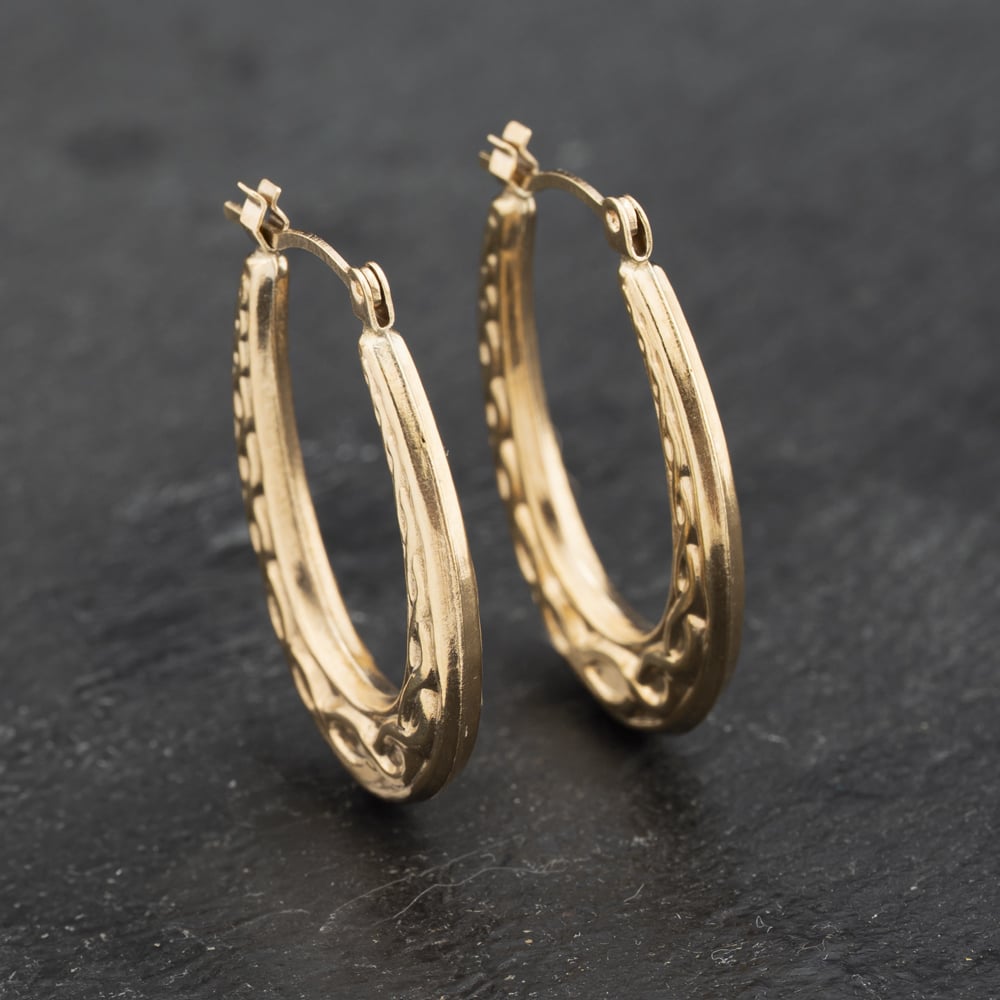 Click to view product details and reviews for Pre Owned Yellow Gold 24mm Celtic Creole Earrings 41173265.
