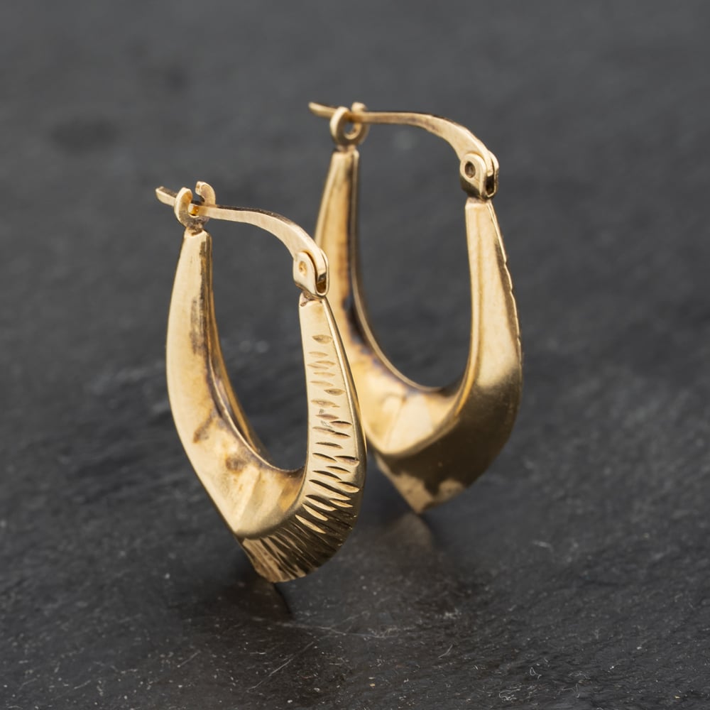 Click to view product details and reviews for Pre Owned Yellow Gold 25mm Diamond Cut Pattern Creole Earrings 41173269.