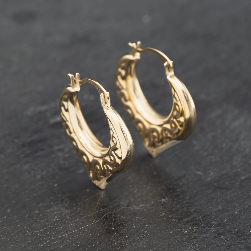 Click to view product details and reviews for Pre Owned Yellow Gold 18mm Celtic Heart Shape Creole Earrings 41173270.