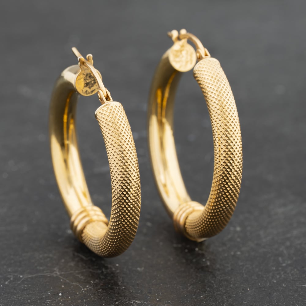 Click to view product details and reviews for Pre Owned 9ct Yellow Gold 74mm Plain And Frosted Hoop Earrings 41173324.