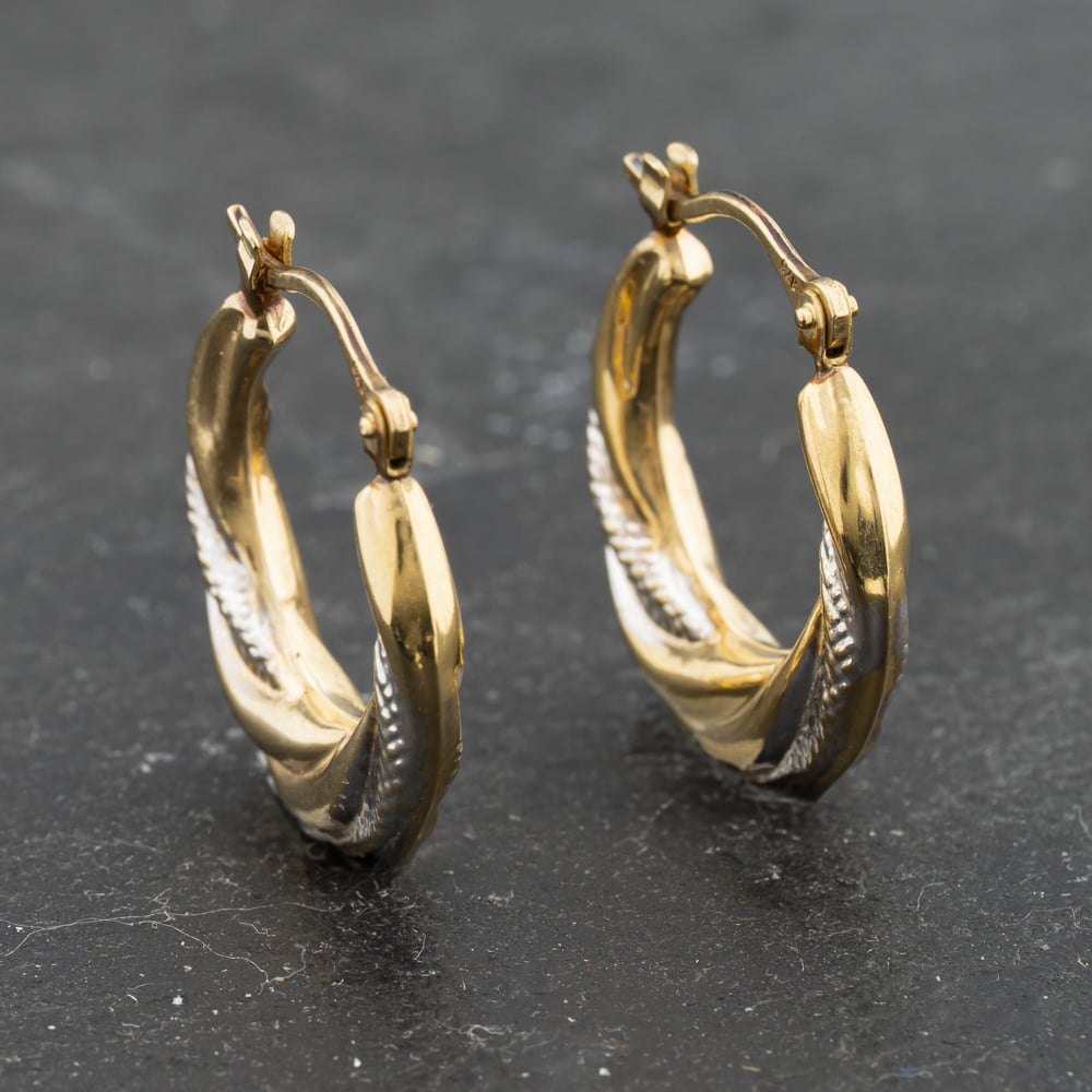 Click to view product details and reviews for Pre Owned Two Colour Gold 67mm Patterned Creole Earrings 41173329.