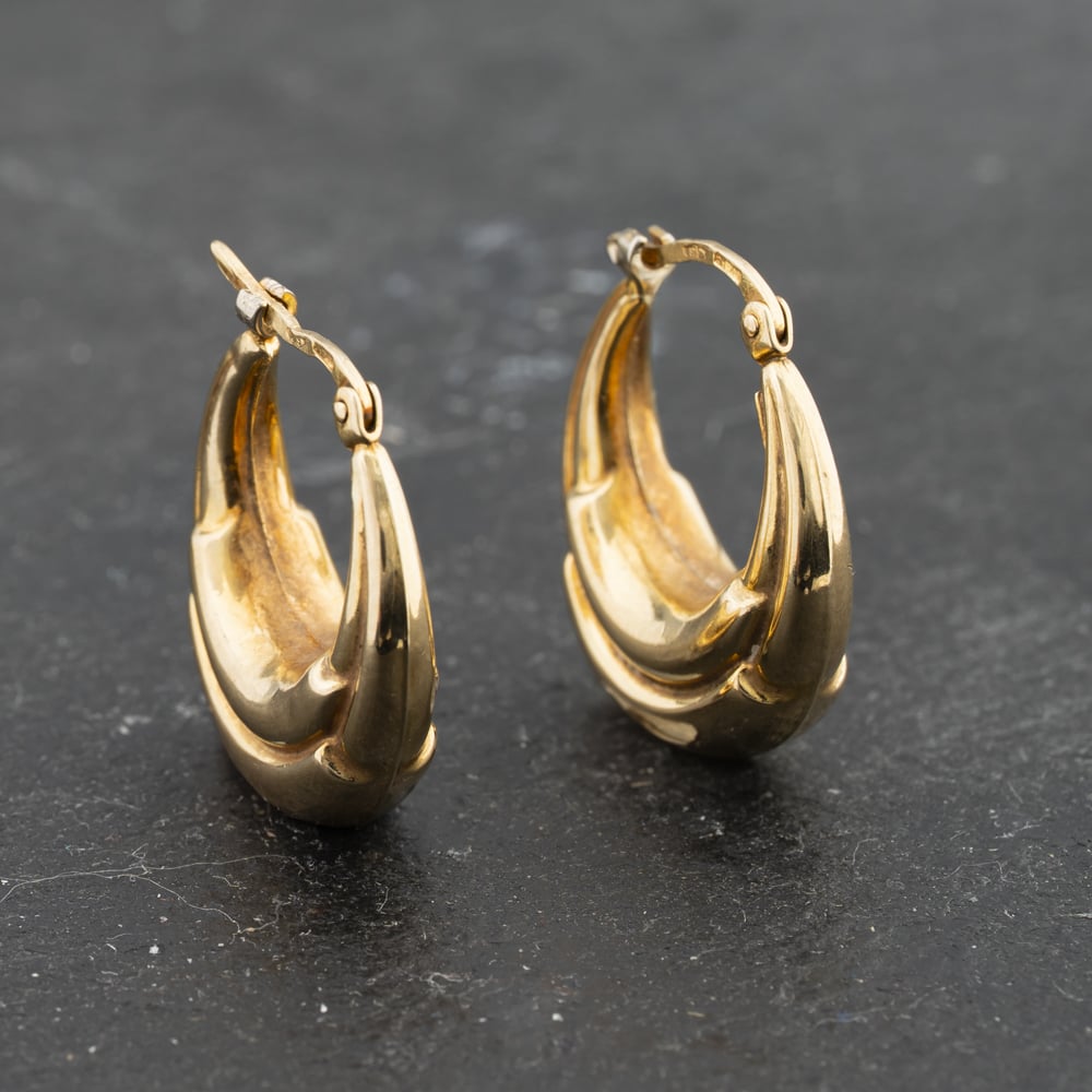 Click to view product details and reviews for Pre Owned 9ct Yellow Gold 64mm Embossed Creole Earrings 41173335. Click to view product details and reviews for Pre Owned 9ct Yellow Gold 64mm Embossed Creole Earrings 41173335.