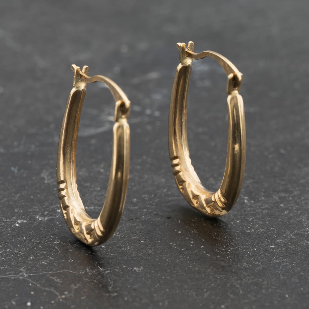 Click to view product details and reviews for Pre Owned Yellow Gold 17mm Small Criss Cross Patterned Creole Earrings 41173346.