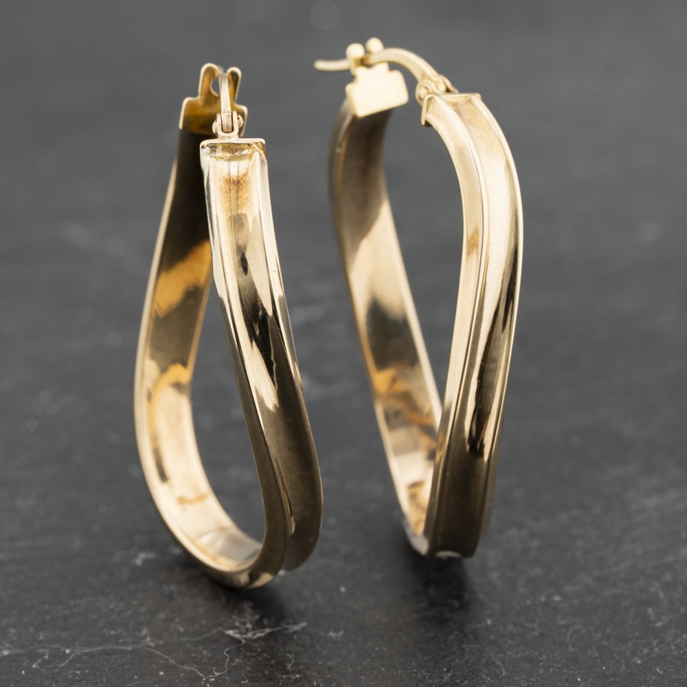 Click to view product details and reviews for Pre Owned Yellow Gold 32mm Twist Creole Earrings 41173358.