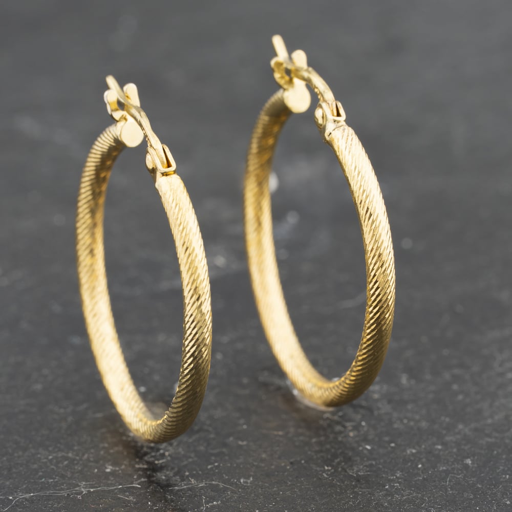 Click to view product details and reviews for Pre Owned 9ct Yellow Gold 24mm Diamond Cut Hoop Earrings 41173385.