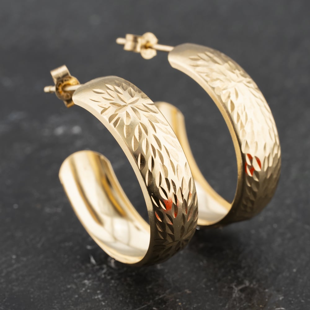 Click to view product details and reviews for Pre Owned Yellow Gold Diamond Cut Spray Pattern Hoop Earrings 41173395.