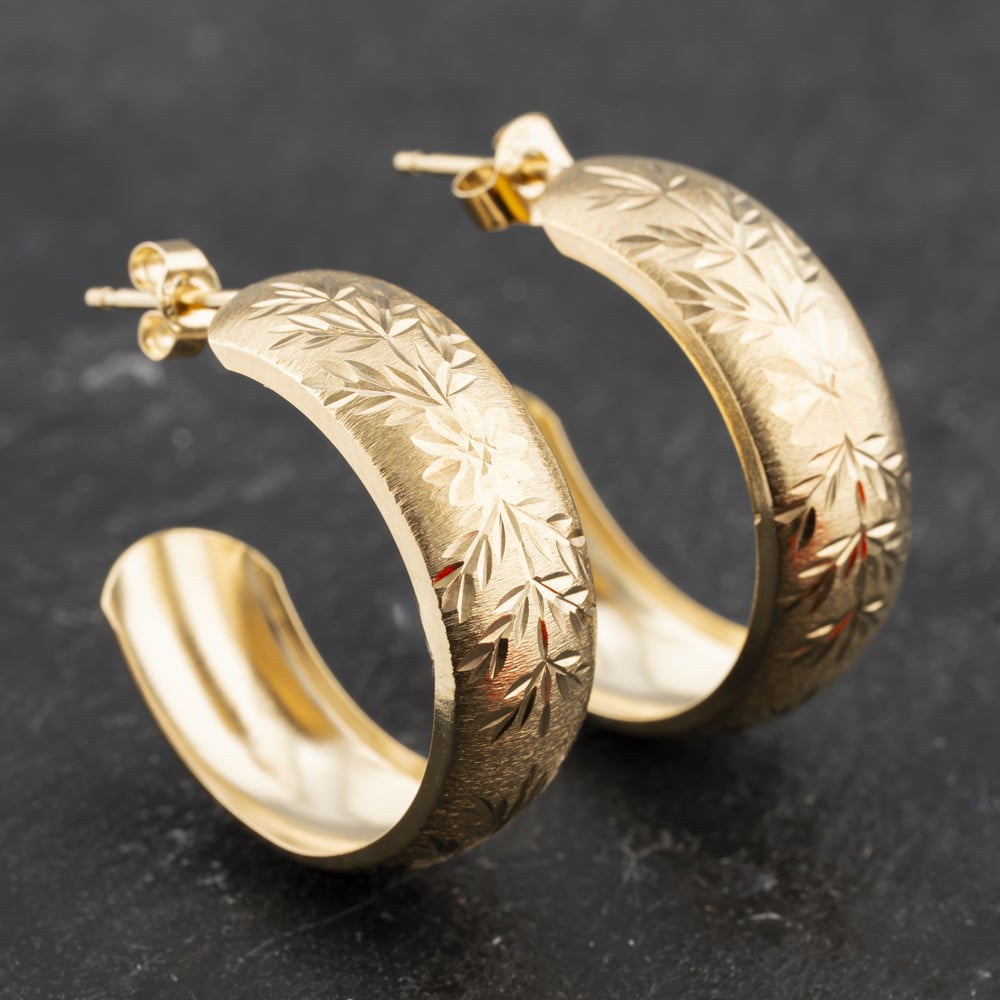 Click to view product details and reviews for Pre Owned 9ct Yellow Gold Diamond Cut Leaf Pattern Hoop Earrings 41173404.