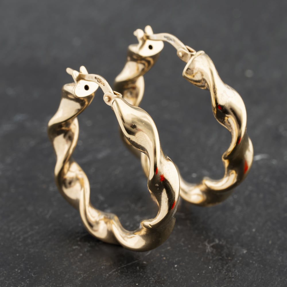 Click to view product details and reviews for Pre Owned 9ct Yellow Gold 27mm Twisted Hoop Earrings 41173406.