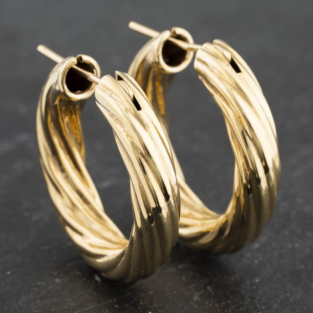 Click to view product details and reviews for Pre Owned 9ct Yellow Gold 28mm Twist Hoop Earrings 41173452.
