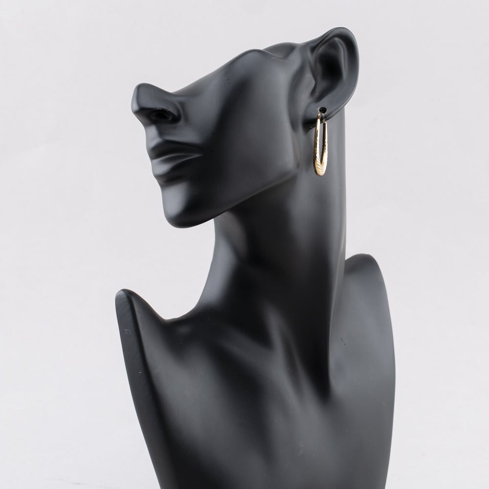 Pre-Owned Yellow Gold 32mm Oval Patterned Creole Earrings 41173456