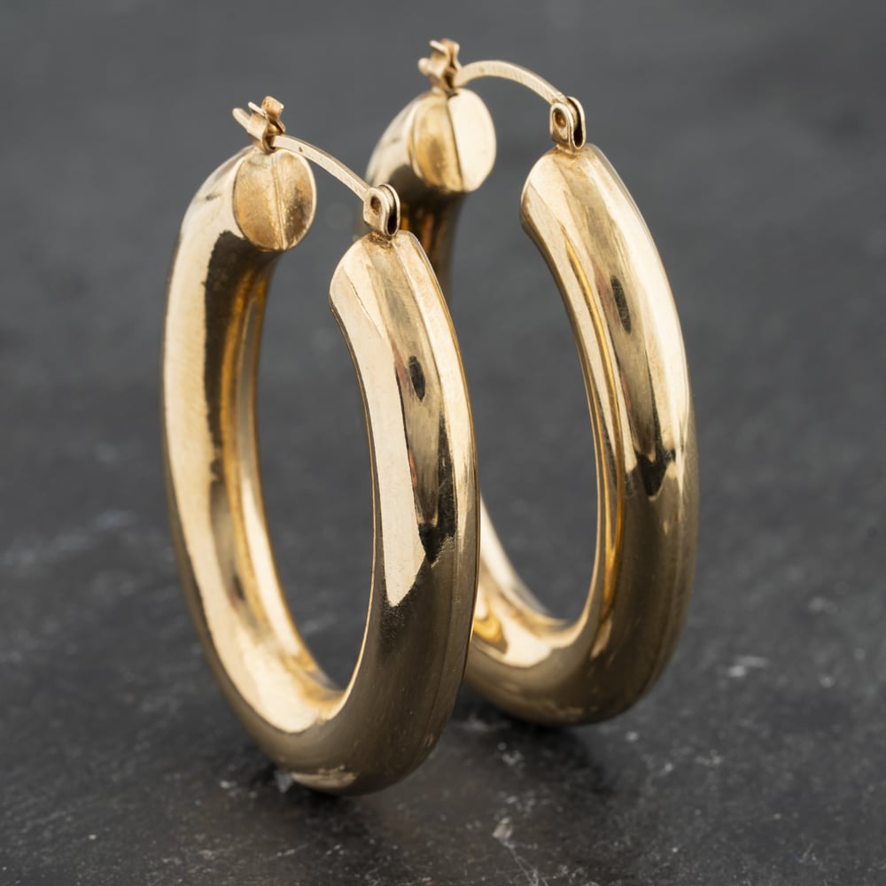Click to view product details and reviews for Pre Owned 9ct Yellow Gold 385mm Oval Chunky Tube Hoop Earrings 41173459.