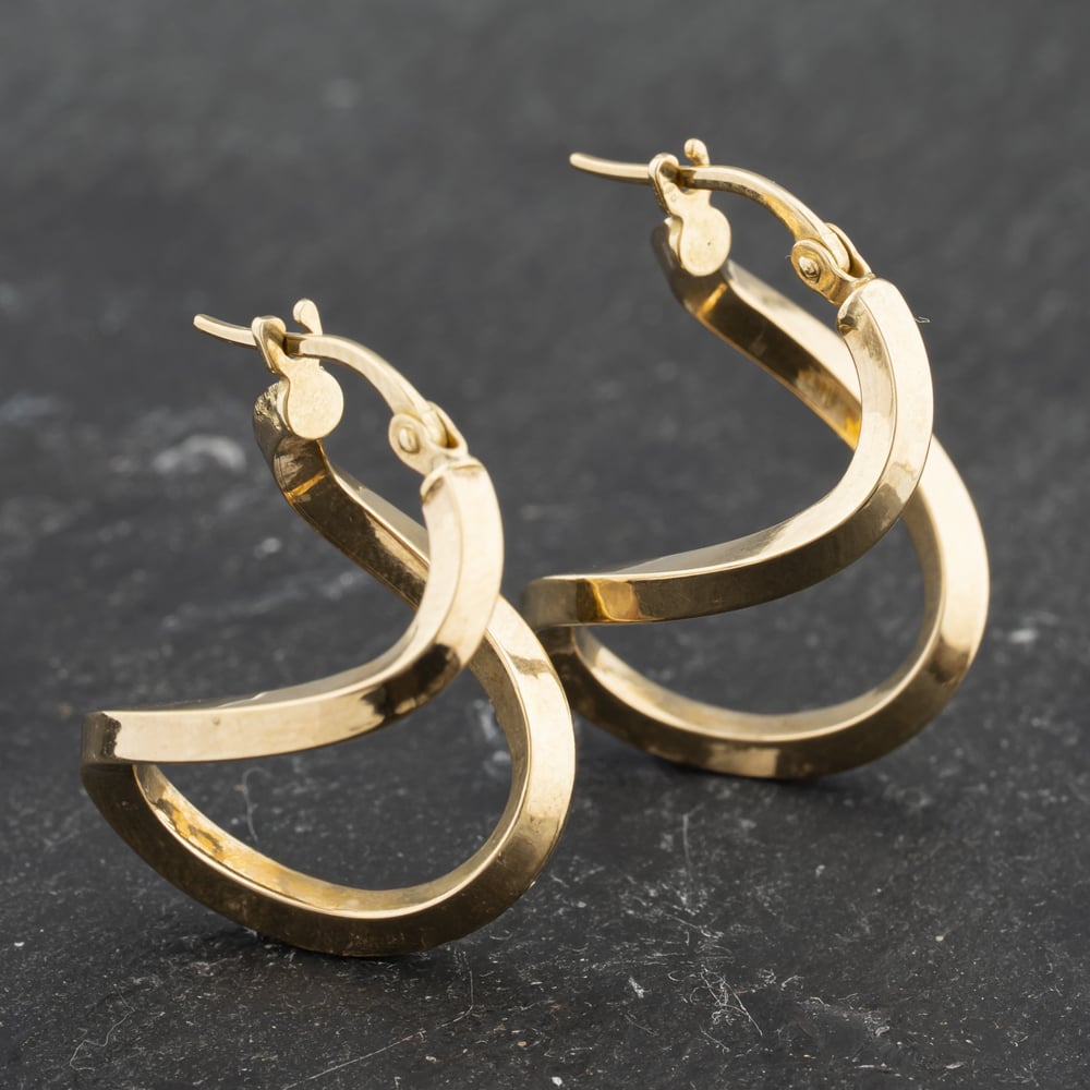 Click to view product details and reviews for Pre Owned Yellow Gold 20mm Swirl Creole Earrings 41173505.