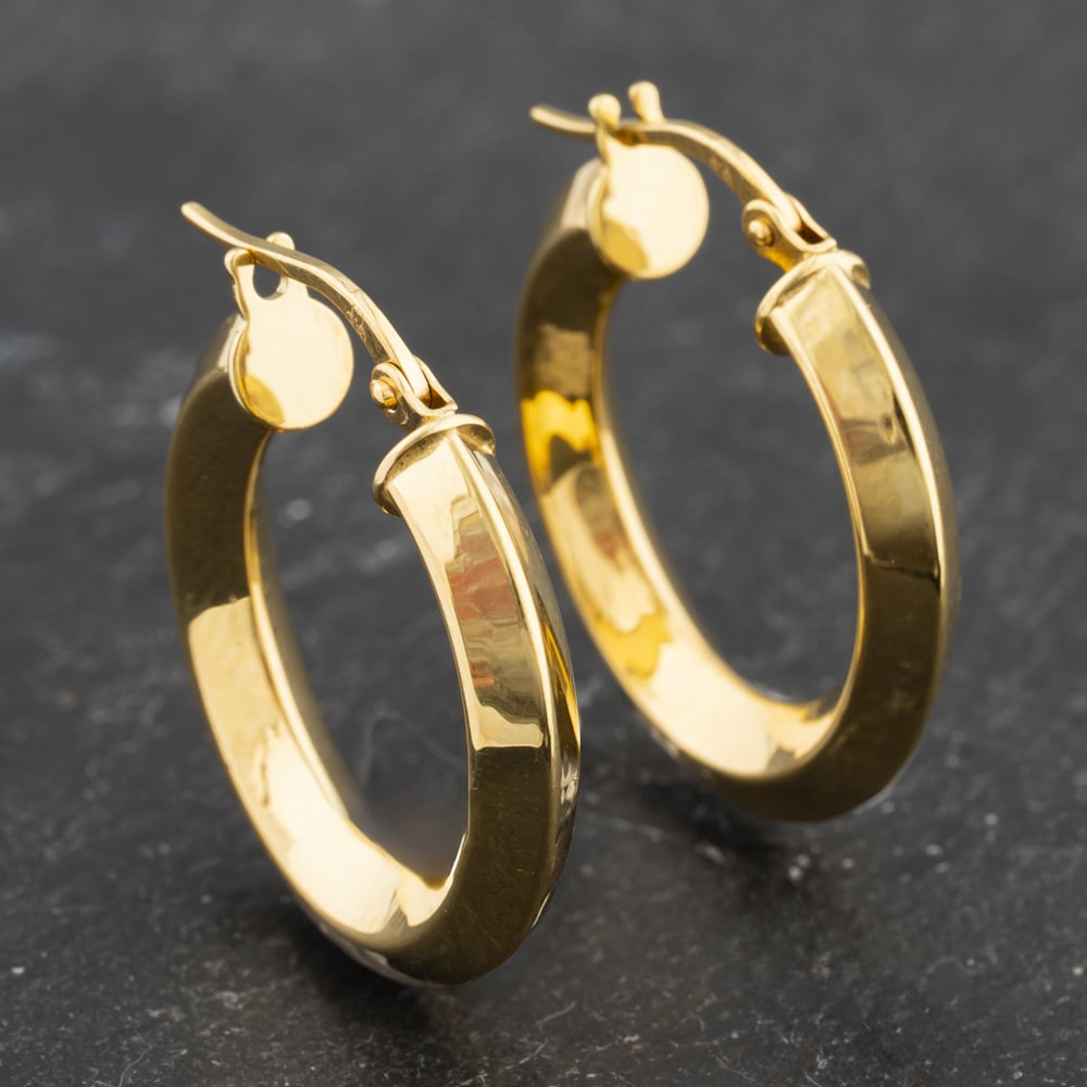 Click to view product details and reviews for Pre Owned Yellow Gold 23mm Plain Hoop Earrings 41173508.