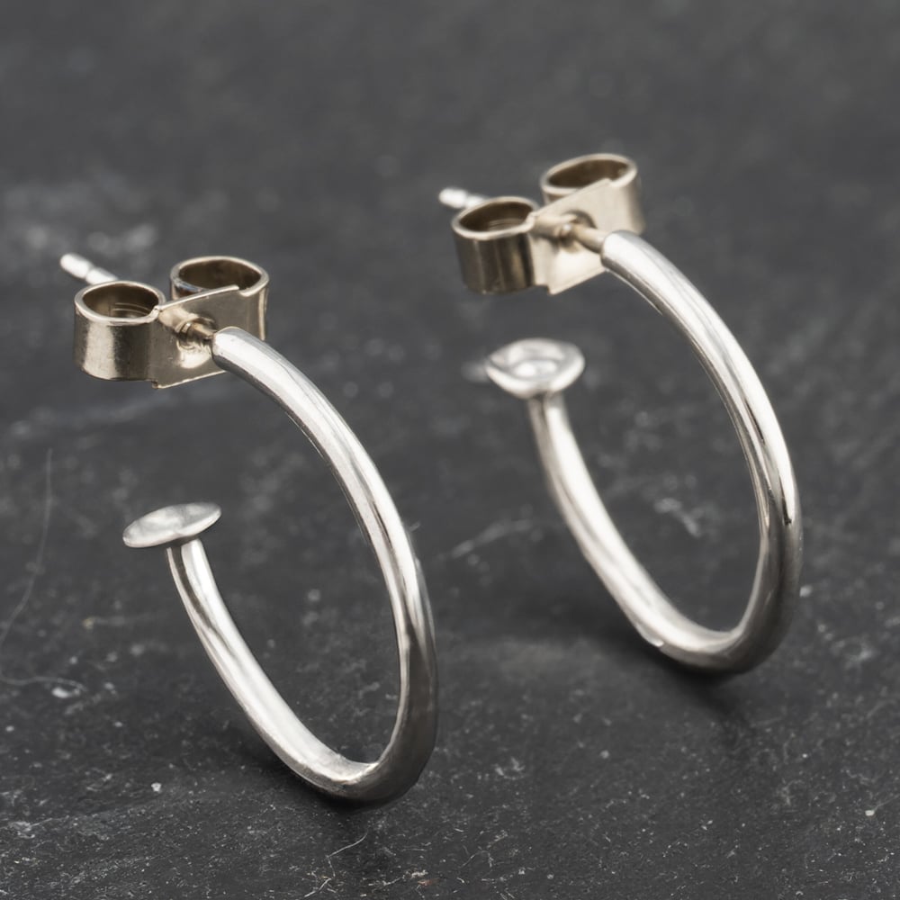 Click to view product details and reviews for Pre Owned White Gold 12mm Half Hoop Earrings 41173527. Click to view product details and reviews for Pre Owned White Gold 12mm Half Hoop Earrings 41173527.