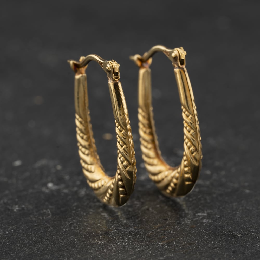 Pre-Owned Yellow Gold 22mm Oval Patterned Creole Earrings 41174526