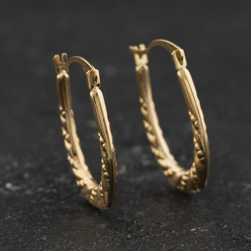 Pre-Owned Yellow Gold Oval Patterned Creole Earrings 41174627