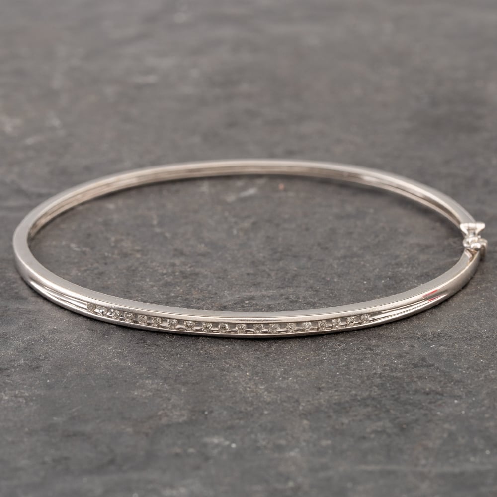 Product photograph of Pre-owned 9ct White Gold Diamond Standard Hinged Bangle 41211152 from The Jewel Hut