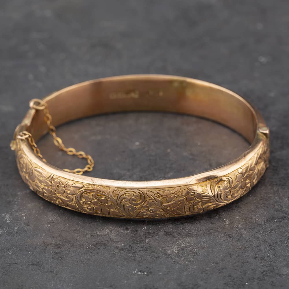 Product photograph of Pre-owned Vintage 9ct Rose Gold Hand Engraved Standard Hinged Bangle 41211201 from The Jewel Hut