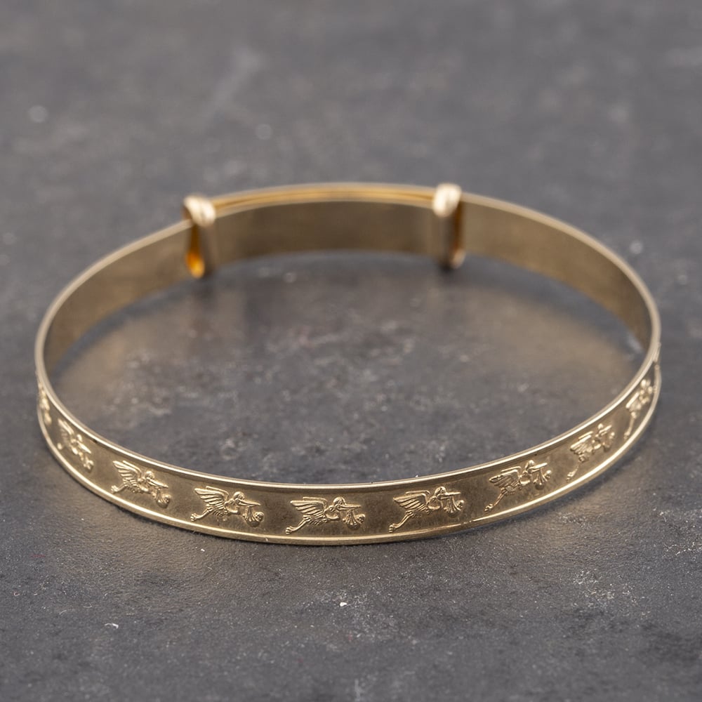 Product photograph of Pre-owned 9ct Yellow Gold Stork Design Small Expandable Bangle 41211242 from The Jewel Hut