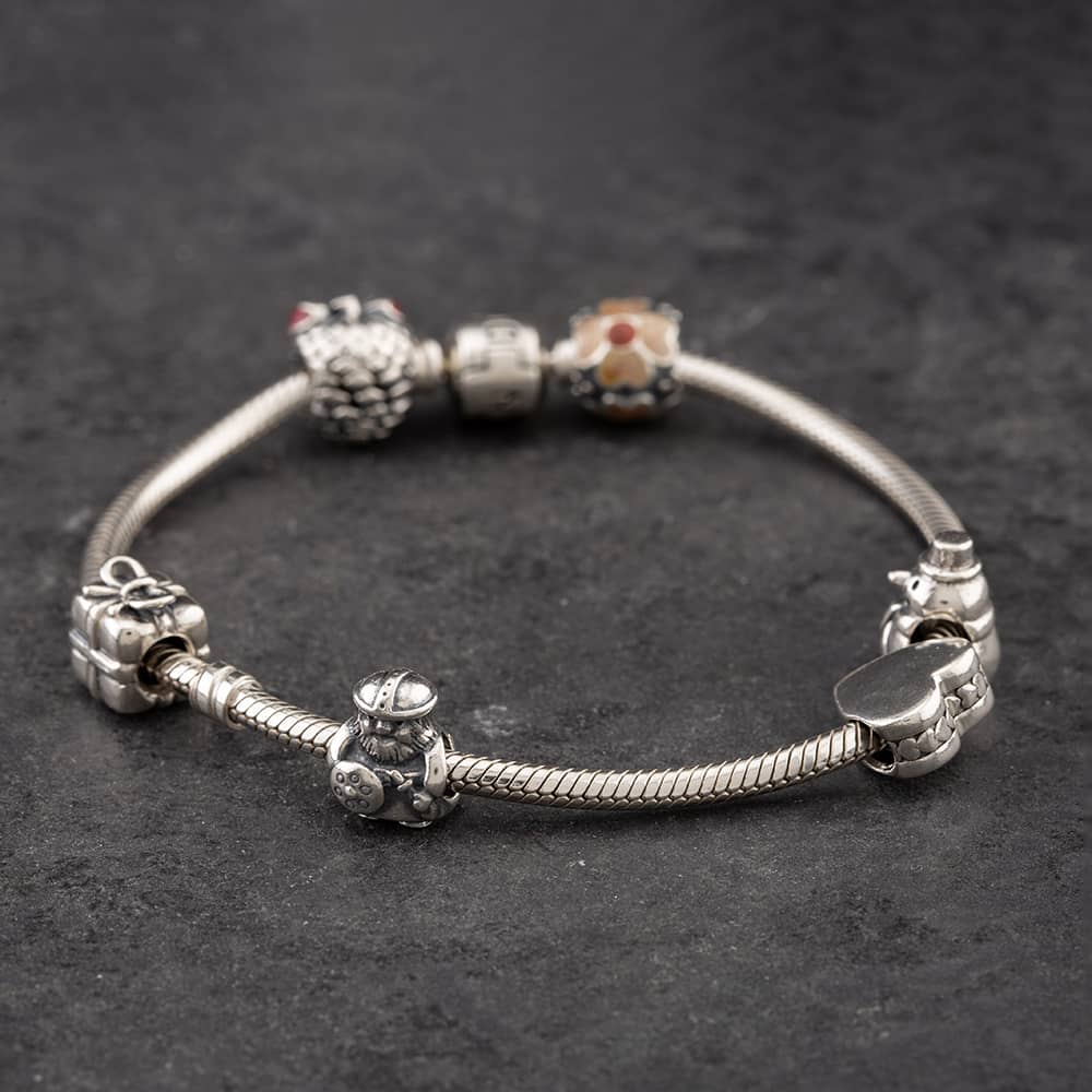 Product photograph of Pre-owned Pandora Silver Christmas Theme 21cm Charm Bracelet 41221260 from The Jewel Hut