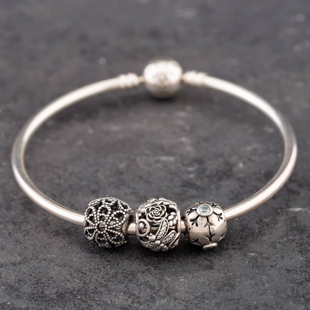 Product photograph of Pre-owned Pandora Silver Standard Charm Bangle 41221326 from The Jewel Hut
