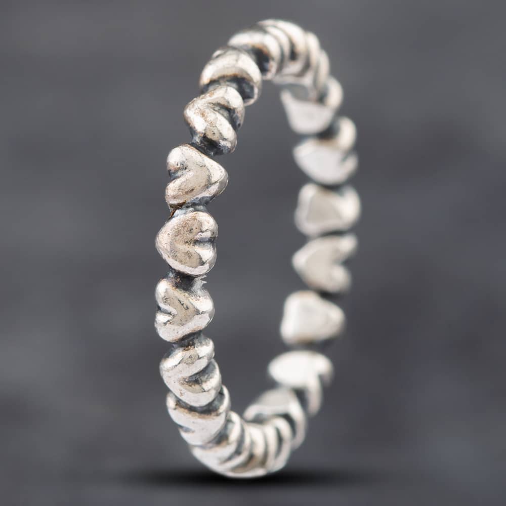 Product photograph of Pre-owned Pandora Silver Hearts Band Ring 41221351 from The Jewel Hut