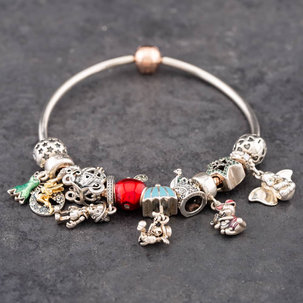 Product photograph of Pre-owned Pandora Silver Amp Rose Gold Plated 12 Charms Included Medium Charm Bangle 41221355 from The Jewel Hut