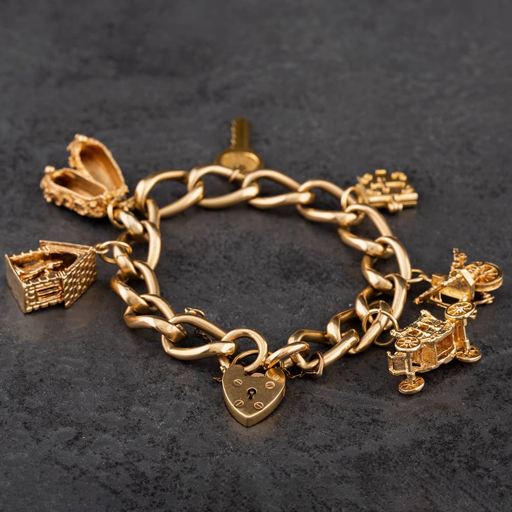 Product photograph of Pre-owned 9ct Yellow Gold With Assorted Charms Vintage 7 25 Inch Charm Bracelet 4123013 from The Jewel Hut