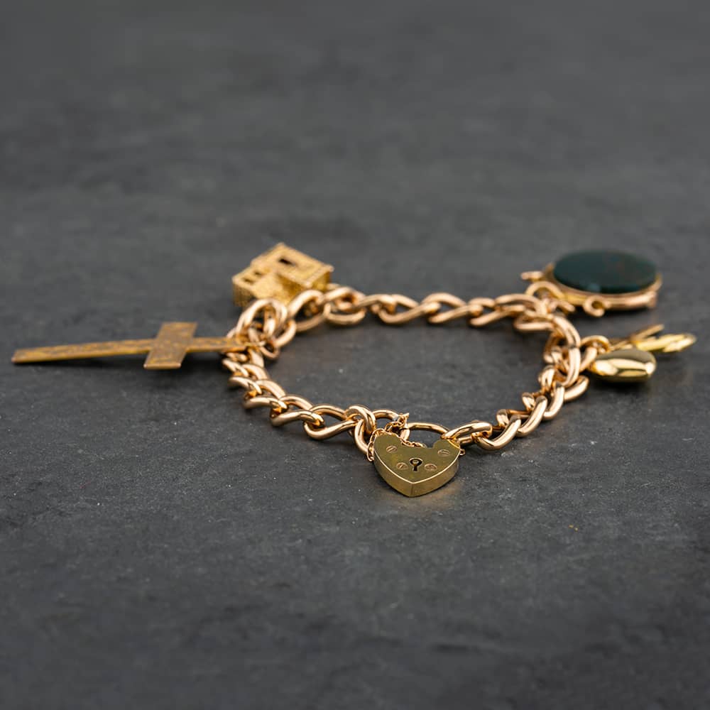 Product photograph of Pre-owned Vintage 9ct Yellow Gold Charm Bracelet 4123039 from The Jewel Hut