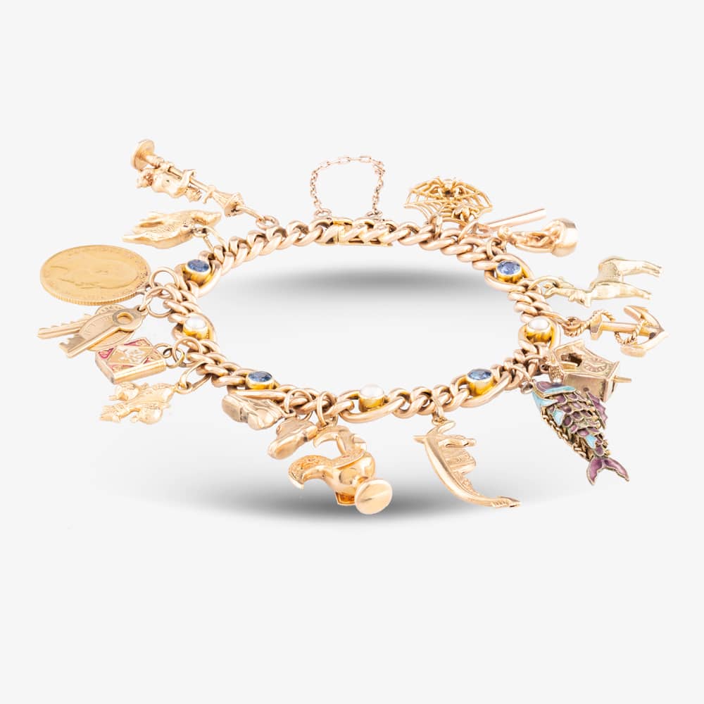 Product photograph of Pre-owned Vintage Yellow Gold Multi Stone Pearl Amp Sapphire Figaro Charm Bracelet 4123040 from The Jewel Hut