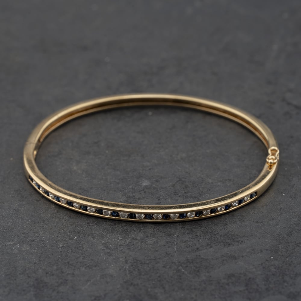 Pre-Owned 9ct Yellow Gold Sapphire &amp; Diamond Channel Set Standard Hinged Bangle 41211466