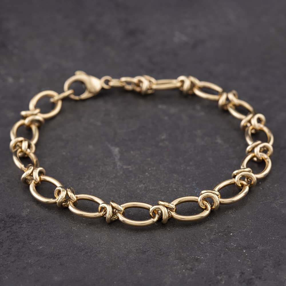 Product photograph of Pre-owned 9ct Yellow Gold Oval Amp Cross Link 7 Inch Chain Bracelet 41281313 from The Jewel Hut