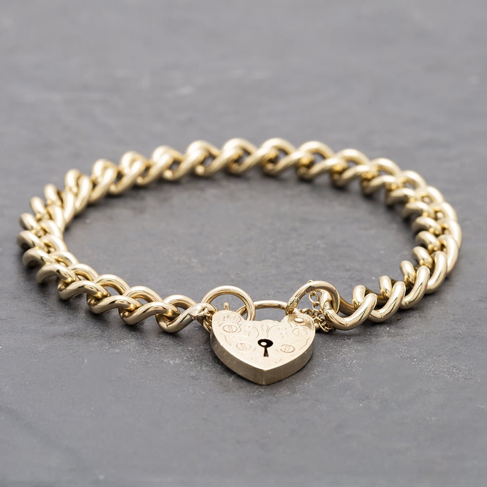 Product photograph of Pre-owned 9ct Yellow Gold With Padlock 7 5 Inch Curb Chain Bracelet 41281333 from The Jewel Hut